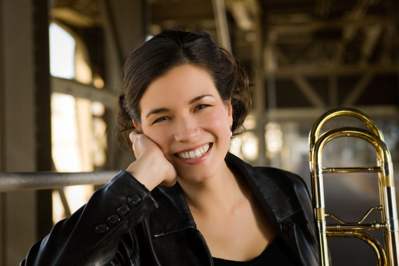 Close-up portrait of Megumi Kanda with her trombone